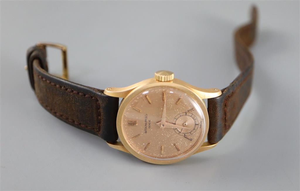 A gentlemans 18k gold Patek Philippe & Co manual wind wrist watch,